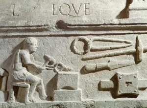 Relief depicting a blacksmith's shop and tools (stone) Relief depicting a blacksmith's shop and tools (stone)
