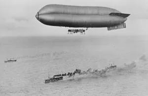 RNAS Coastal Class Airship C23A Flying above a Warship Convoy, c.1917 (b/w photo) RNAS Coastal Class Airship C23A Flying above a Warship Convoy, c.1917 (b/w photo)
