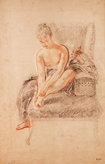 Semi-nude woman seated on a chaise longue, holding her foot (sanguine and black chalk Semi-nude woman seated on a chaise longue, holding her foot (sanguine and black chalk