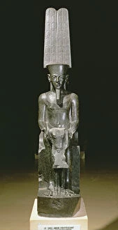Amon Collection: Statue of the god Amun protecting Tutankhamun, Egyptian, New Kingdom, c