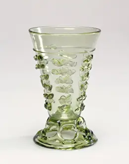 Print of a Footed Beaker in pale yellow-green glass