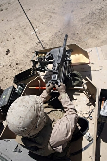 A 40 mm grenade flies from the muzzle of a MK-19 automatic grenade launcher A 40 mm grenade flies from the muzzle of a MK-19 automatic grenade launcher