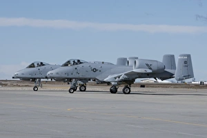 Two A-10 Thunderbolts prepare to taxi to the runway Two A-10 Thunderbolts prepare to taxi to the runway