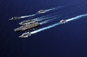 The Abraham Lincoln Carrier Strike Group ships cruise in formation in the Pacific Ocean The Abraham Lincoln Carrier Strike Group ships cruise in formation in the Pacific Ocean
