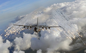 An AC-130U gunship jettisons flares over Florida An AC-130U gunship jettisons flares over Florida