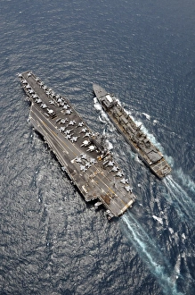 Aerial view of aircraft carrier USS Ronald Reagan and USNS Bridge during a replenishment Aerial view of aircraft carrier USS Ronald Reagan and USNS Bridge during a replenishment
