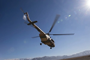 An Afghan Air Force Mil Mi-17 helicopter over Afghanistan An Afghan Air Force Mil Mi-17 helicopter over Afghanistan