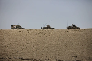 Afghan Army convoy drives along the wadi ridge in Afghanistan Afghan Army convoy drives along the wadi ridge in Afghanistan