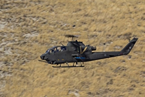 An AH-1F Tzefa of the Israeli Air Force flying over Israel An AH-1F Tzefa of the Israeli Air Force flying over Israel