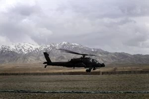 Ah 64 Collection: An AH-64A Apache taking off from Forward Operating Base Gardez in Afghanistan