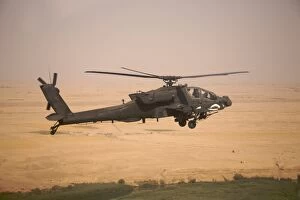 Ah 64 Collection: AH-64D Apache helicopter on a mission over Northern Iraq