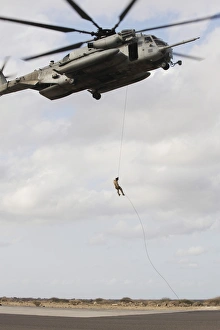 An Air Force pararescueman conducts a combat insertion and extraction exercise in Djibouti An Air Force pararescueman conducts a combat insertion and extraction exercise in Djibouti