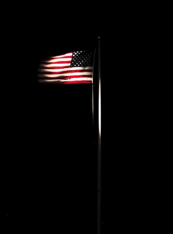 The American flag flies over Naval Station Guantanamo Bay, Cuba The American flag flies over Naval Station Guantanamo Bay, Cuba
