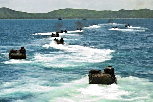 Amphibious assault vehicles approach Hat Yao beach, Thailand Amphibious assault vehicles approach Hat Yao beach, Thailand