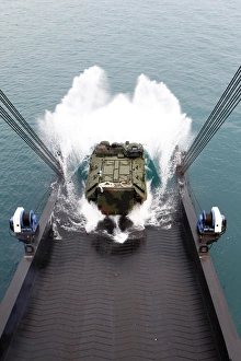 Amphibious assault vehicles disembark from USNS 1st LT Jack Lummus Amphibious assault vehicles disembark from USNS 1st LT Jack Lummus