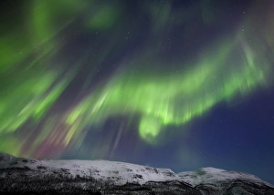 Aurora borealis over Blafjellet Mountain in Troms County, Norway Aurora borealis over Blafjellet Mountain in Troms County, Norway