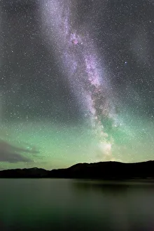 Aurora borealis and Milky Way above Fish Lake, Yukon, Canada Aurora borealis and Milky Way above Fish Lake, Yukon, Canada