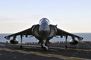 An AV-8B Harrier maneuvers on the flight deck of USS Kearsarge An AV-8B Harrier maneuvers on the flight deck of USS Kearsarge