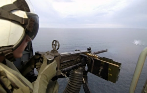 Aviation Warfare Systems Operator fires a Aviation Warfare Systems Operator fires a