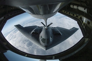 A B-2 Spirit bomber refuels from a KC-135 Stratotanker A B-2 Spirit bomber refuels from a KC-135 Stratotanker