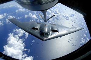A B-2 Spirit moves into position for refueling from a KC-135 Stratotanker A B-2 Spirit moves into position for refueling from a KC-135 Stratotanker