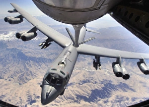 A B-52 Stratofortress receives fuel from a KC-135 Stratotanker over Afghanistan A B-52 Stratofortress receives fuel from a KC-135 Stratotanker over Afghanistan