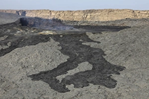 Basaltic lava flow from pit crater, Erta Ale volcano, Danakil Depression, Ethiopia Basaltic lava flow from pit crater, Erta Ale volcano, Danakil Depression, Ethiopia
