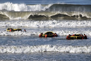 Basic Underwater Demolition/SEAL students participate in a surf passage training exercise Basic Underwater Demolition/SEAL students participate in a surf passage training exercise