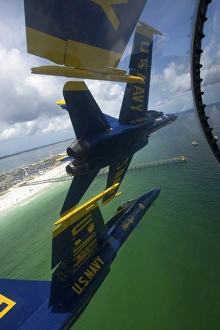 The Blue Angels perform the Diamond 360 maneuver over Florida The Blue Angels perform the Diamond 360 maneuver over Florida