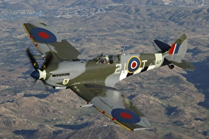 British Supermarine Spitfire Mk-16 flying over Northern California coastline British Supermarine Spitfire Mk-16 flying over Northern California coastline