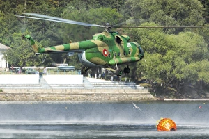 Bulgarian Air Force Mi-17 taking water with Bambi Bucket Bulgarian Air Force Mi-17 taking water with Bambi Bucket