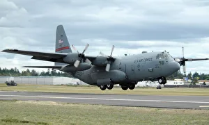 A C-130 Hercules lands at McChord Air Force Base, Washington A C-130 Hercules lands at McChord Air Force Base, Washington