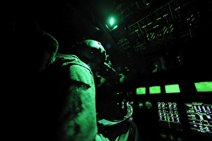 A C-130J aircraft commander prepares for take off A C-130J aircraft commander prepares for take off