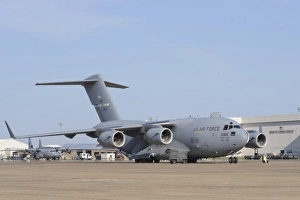 A C-17 Globemaster III parked on the ramp at an Air Force base A C-17 Globemaster III parked on the ramp at an Air Force base