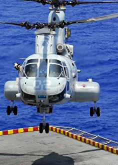 A CH-46E Sea Knight helicopter prepares to land on the flight deck of USS Peleliu A CH-46E Sea Knight helicopter prepares to land on the flight deck of USS Peleliu