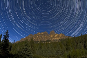 Circumpolar stars trails over Castle Mountain in Banff National Park, Canada Circumpolar stars trails over Castle Mountain in Banff National Park, Canada