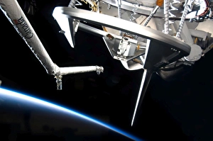 Components of Space Shuttle Discovery backdropped by Earths horizon Components of Space Shuttle Discovery backdropped by Earths horizon