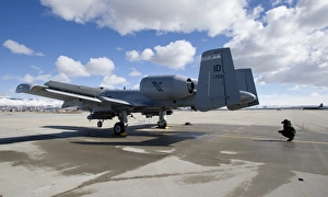 A crew chief performs preflight inspections on an A-10 Thunderbolt A crew chief performs preflight inspections on an A-10 Thunderbolt