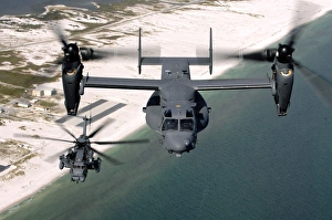 A CV-22 Osprey and an MH-53 Pave Low fly over the coastline of Florida A CV-22 Osprey and an MH-53 Pave Low fly over the coastline of Florida