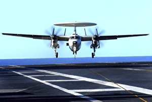 An E-2C Hawkeye approaches for landing aboard USS John C Stennis An E-2C Hawkeye approaches for landing aboard USS John C Stennis