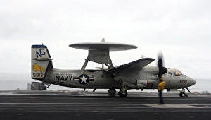 An E-2C Hawkeye launches from the flight deck of USS John C. Stennis An E-2C Hawkeye launches from the flight deck of USS John C. Stennis