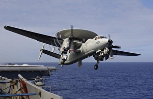An E-2C Hawkeye launches from USS Kitty Hawk An E-2C Hawkeye launches from USS Kitty Hawk