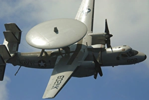 An E-2C Hawkeye makes a low pass during practice for an air power demonstration An E-2C Hawkeye makes a low pass during practice for an air power demonstration