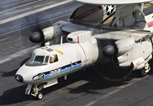 An E-2C Hawkeye sits ready aboard USS Harry S. Truman An E-2C Hawkeye sits ready aboard USS Harry S. Truman