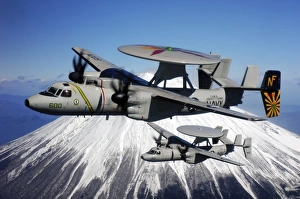 Two E-2C Hawkeyes conduct a flyby of Mount Fuji in Japan Two E-2C Hawkeyes conduct a flyby of Mount Fuji in Japan