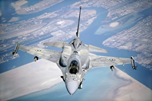 An Emirati F-16 conducts a training mission during a multinational exercise An Emirati F-16 conducts a training mission during a multinational exercise