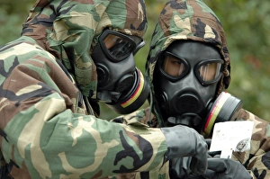 Military Photography Prints: Explosive Ordnance Technicians run tests on substances