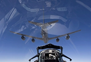 An F-15 Eagle pulls into position behind a KC-135 Stratotanker An F-15 Eagle pulls into position behind a KC-135 Stratotanker