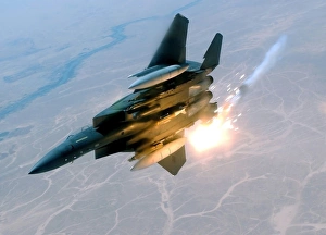 An F-15E Strike Eagle pops flares during a combat sortie An F-15E Strike Eagle pops flares during a combat sortie