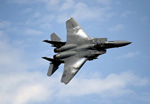 An F-15E Strike Eagle soars through the sky An F-15E Strike Eagle soars through the sky